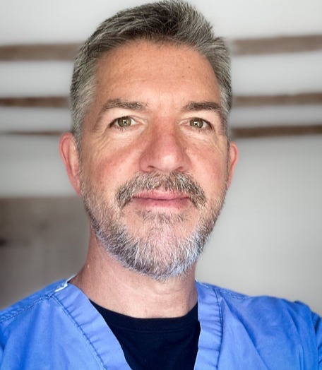 Dr Edric Cross